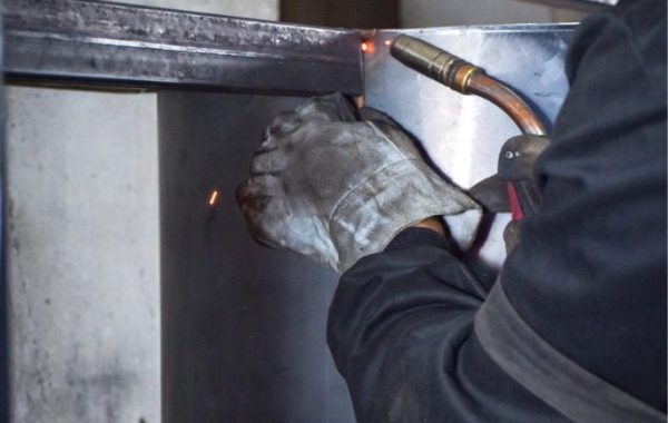 A professional welder providing aluminum welding in Peoria IL for an industrial facility