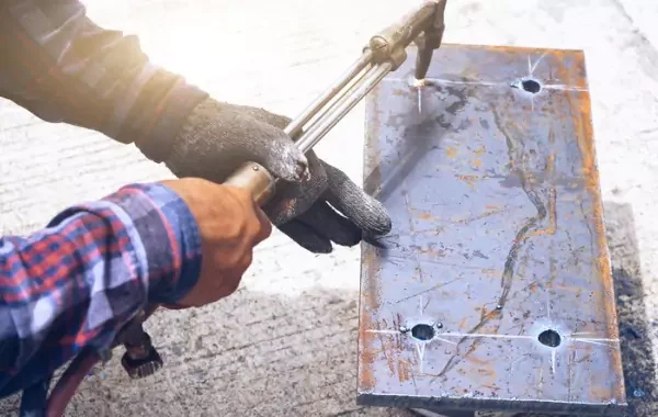 A worker is seen repairing metal. 3D Welding performs mobile metal repair in central Illinois.