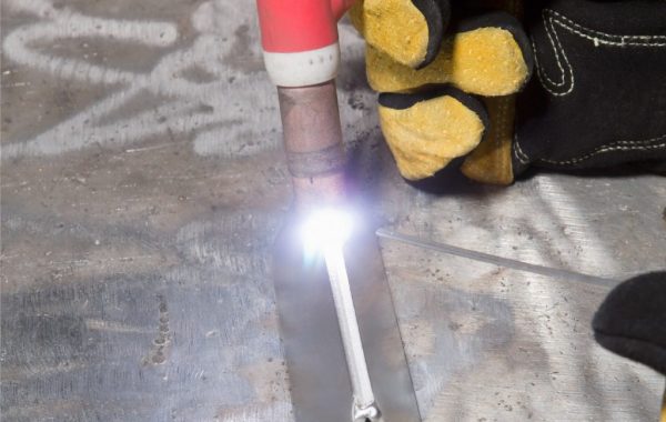 An aluminum TIG welder in Illinois performing precise welding