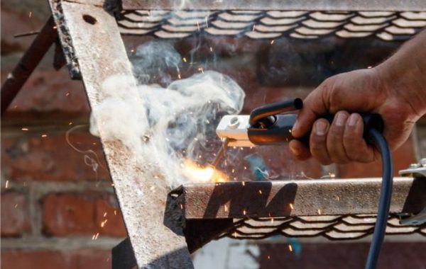 A worker providing mobile welding services in Peoria IL