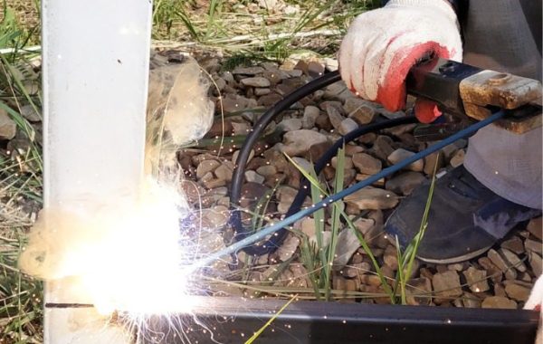 A worker performing aluminum welding in Illinois